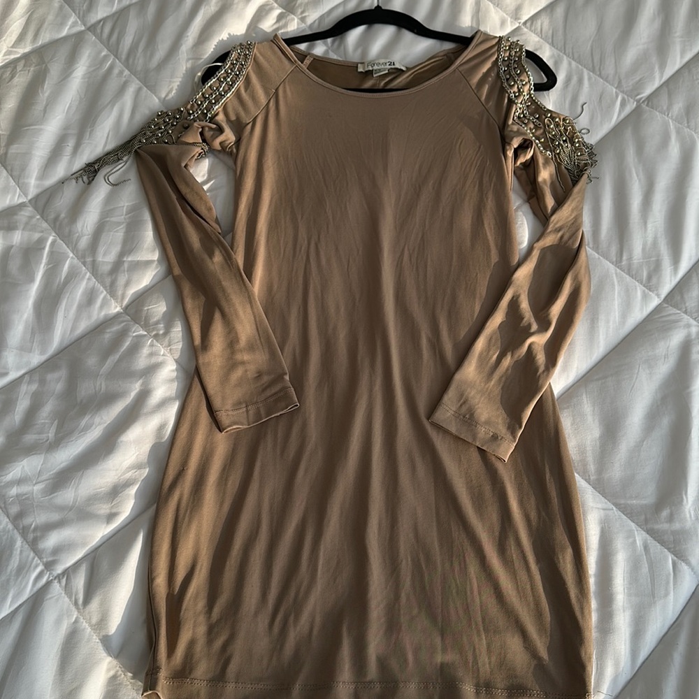 Medium nude mini dress with chain & stud detailing on the sleeve